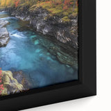 Framed canvas artwork showcasing a vibrant landscape of canyons in warm earth tones, highlighting intricate textures and details, ideal for home decor.