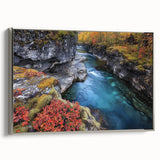 Framed canvas artwork depicting a stunning landscape of canyons with intricate details and a silver frame, perfect for enhancing home decor.