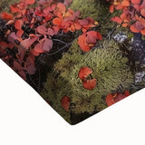 Close-up of a stretched canvas artwork depicting a vibrant landscape of canyons, showcasing rich earthy tones and intricate details, ideal for home decor enhancement.