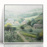 Framed landscape wall art depicting a serene countryside scene with lush greenery and a clear blue sky, featuring a sleek white frame for elegant display.