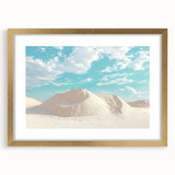 Elegant gold-framed landscape artwork depicting a serene desert scene, featuring gentle sand dunes and a clear blue sky, perfect for home decor.