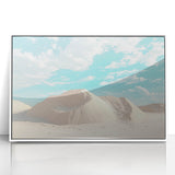 Framed acrylic landscape artwork depicting a vibrant desert scene with warm hues of orange and yellow, set in a sleek white frame, ideal for modern decor.