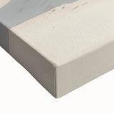 Close-up of a stretched canvas depicting a vibrant desert landscape with warm colors, showcasing intricate details of sand dunes and a clear blue sky, perfect for home decor.