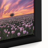 Close-up of a vibrant framed canvas depicting a serene landscape with lush green fields and a clear blue sky, perfect for home decor. This artwork adds a calming touch to any space.