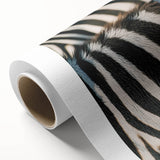 Art deco poster featuring a stylized giraffe in muted gold and beige tones on rolled canvas, ideal for nursery wall art.