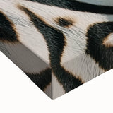 Black and white stretched canvas featuring a close-up of a zebra, ideal for modern bedroom wall art.