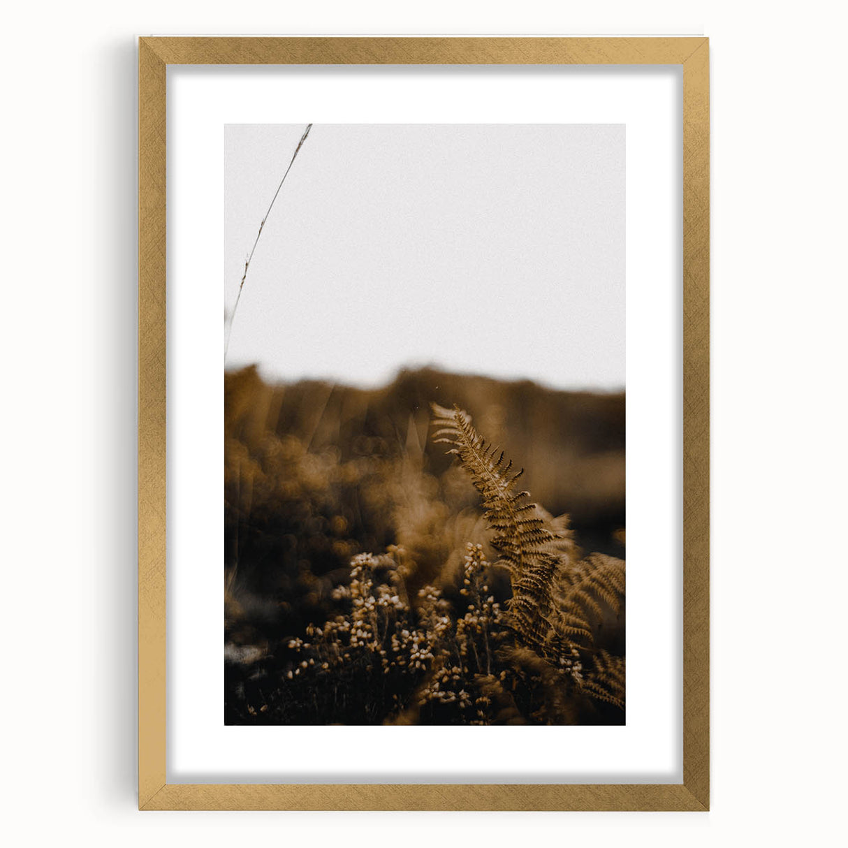 Extra large abstract art print featuring textured autumnal hues in a gold frame, ideal for living room decor.