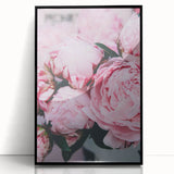 Large abstract wall art depicting spring, with vibrant green and yellow tones on a black framed acrylic.