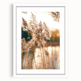 Abstract art print depicting vibrant summer hues on a white framed canvas, suitable for bedroom or dining room decor.