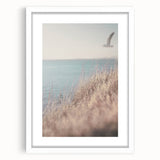 Abstract art print featuring swirling blue and white patterns on a framed canvas, suitable for dining room or bedroom decor.