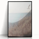 Large abstract wall art in mid-century modernist style, featuring vibrant orange and yellow tones on a framed acrylic print.