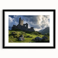 Framed landscape artwork depicting a majestic castle surrounded by lush greenery, presented with a sleek black mat and frame, perfect for home decor.
