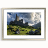 Elegant silver-framed landscape artwork featuring a majestic castle, set against a serene backdrop, with a classic mat for added sophistication. Perfect for enhancing home decor.
