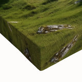 Close-up of a stretched canvas depicting a vibrant landscape with a majestic castle, showcasing rich colors and intricate details, ideal for home decor.