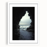 Framed landscape artwork depicting a cave scene, featuring a white mat and a sleek black frame, ideal for modern home decor. The image showcases intricate details and earthy tones that enhance its natural beauty.