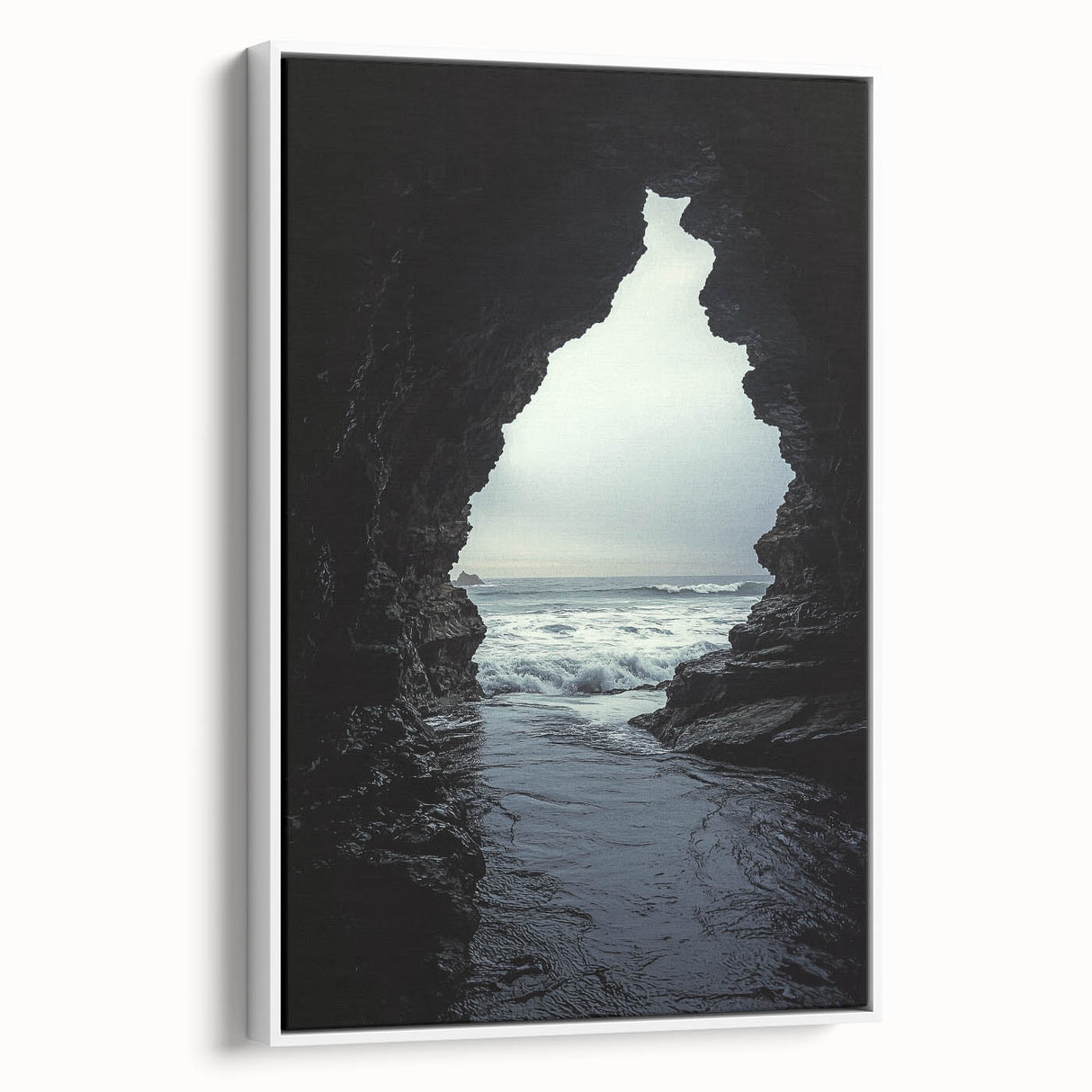 Framed canvas artwork depicting a serene landscape with caves, showcasing earthy tones and intricate details, perfect for enhancing home decor.