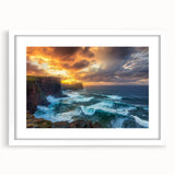 Framed landscape artwork showcasing dramatic cliffs and vibrant skies, set in a sleek white mat, perfect for modern home decor and art enthusiasts.