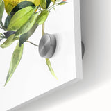 Close-up of large abstract fruit-themed wall art in acrylic glass, featuring vibrant oranges and yellows.