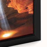 Close-up view of a framed canvas artwork depicting vibrant canyons in a landscape setting, showcasing rich colors and intricate details, ideal for home decor.