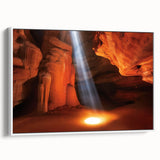 Framed canvas artwork depicting a vibrant landscape of canyons in earthy tones, showcasing intricate details and textures. The piece is displayed in a sleek white frame, perfect for adding a natural touch to modern home decor.