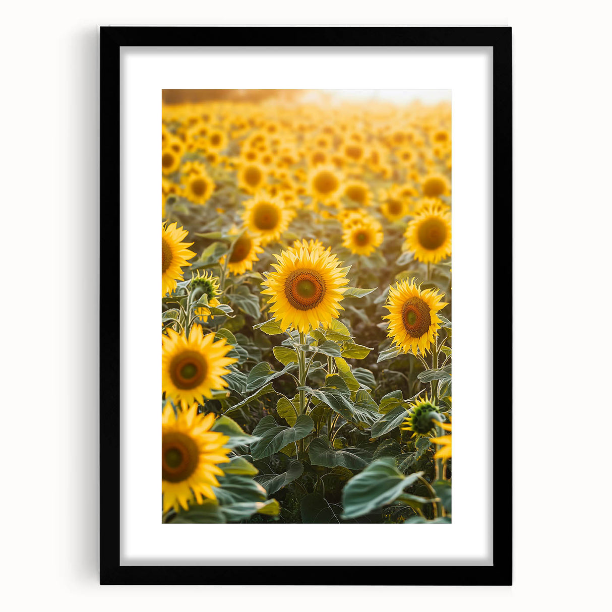 Black-framed landscape artwork featuring a serene countryside scene with vibrant green fields and a clear blue sky, elegantly presented with a white mat for added depth.