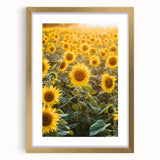 Elegant gold-framed landscape art print showcasing a serene countryside scene with lush greenery and rolling hills, perfect for home decor enhancement.