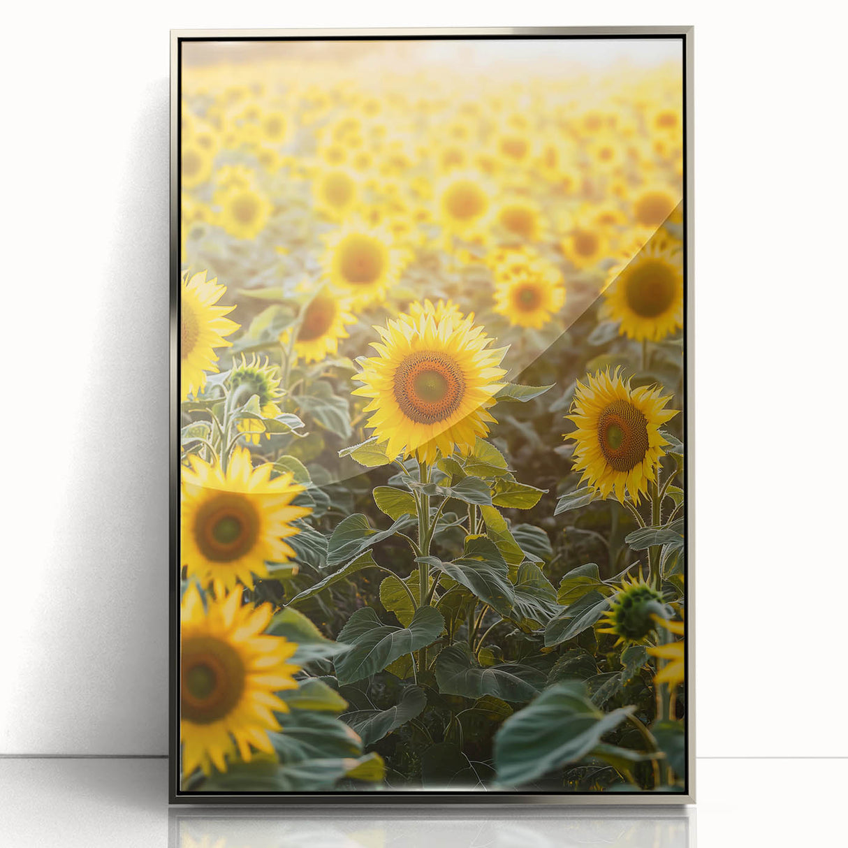 Framed acrylic artwork of a serene countryside landscape, showcasing lush green fields and distant hills under a clear blue sky, elegantly displayed with a silver frame for modern decor.