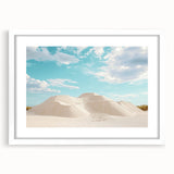 Desert landscape framed art print with a white mat, showcasing warm tones of brown and orange, ideal for home decor or office spaces, front view.
