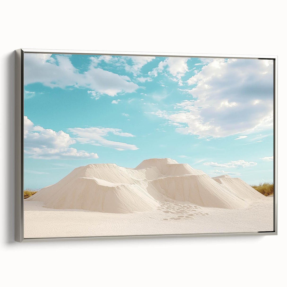 Framed canvas artwork showcasing a stunning desert landscape with vibrant colors, displayed in an elegant silver frame, ideal for modern home decor.