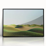 Framed acrylic artwork depicting a serene landscape of rolling green fields under a blue sky, with a sleek black frame enhancing its modern aesthetic. Perfect for home decor.