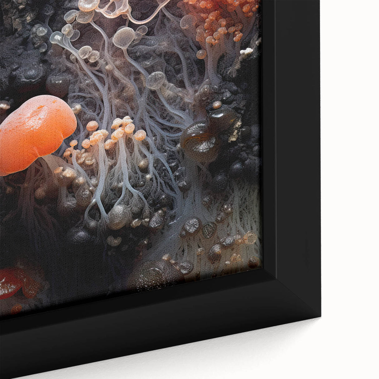 Close-up of textured black wall art featuring colorful abstract elements on a large framed canvas.