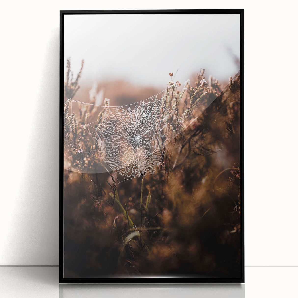 Large abstract wall art featuring swirling autumnal hues on black acrylic, framed, ideal for modern living room decor.