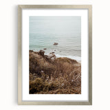 Textured abstract art print in muted pastel shades on a framed silver canvas, suitable for bedroom decor.