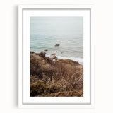 Abstract art print featuring swirling blue and white patterns on a framed canvas, ideal for dining room decor.