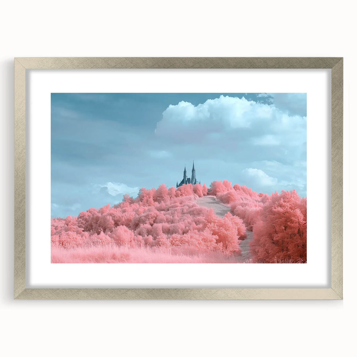 Elegant silver-framed landscape artwork depicting a majestic castle surrounded by lush greenery, featuring a double mat for added depth and sophistication, ideal for home decor.