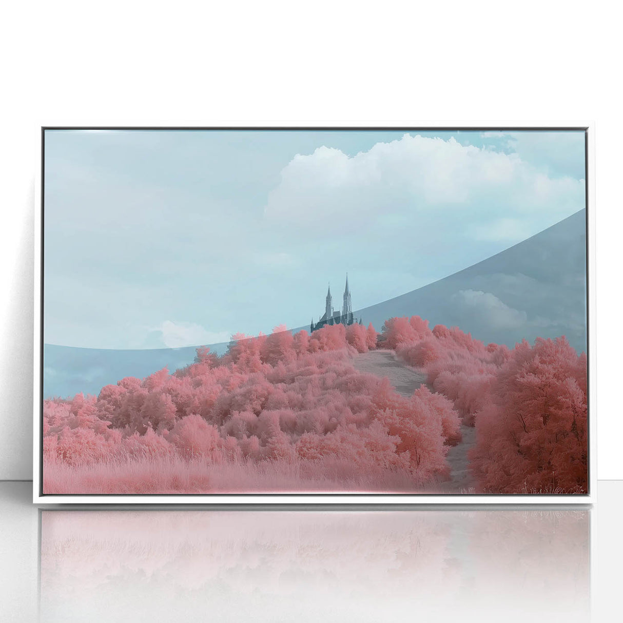 Framed acrylic artwork showcasing a serene landscape with a majestic castle surrounded by lush greenery, presented in a sleek white frame for modern decor.
