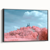 Framed canvas artwork depicting a scenic landscape with a majestic castle, featuring a black frame and side view to highlight its elegant design and craftsmanship.
