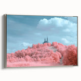 Framed canvas artwork showcasing a serene landscape with a majestic castle, featuring a silver frame and side view, perfect for home decor enthusiasts.