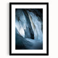 Framed landscape artwork depicting a serene cave scene, featuring a black mat and sleek black frame, perfect for modern home decor and nature enthusiasts.