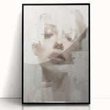 Framed abstract figurative wall art featuring bold black and white designs, set against a sleek acrylic frame, ideal for modern home decor.
