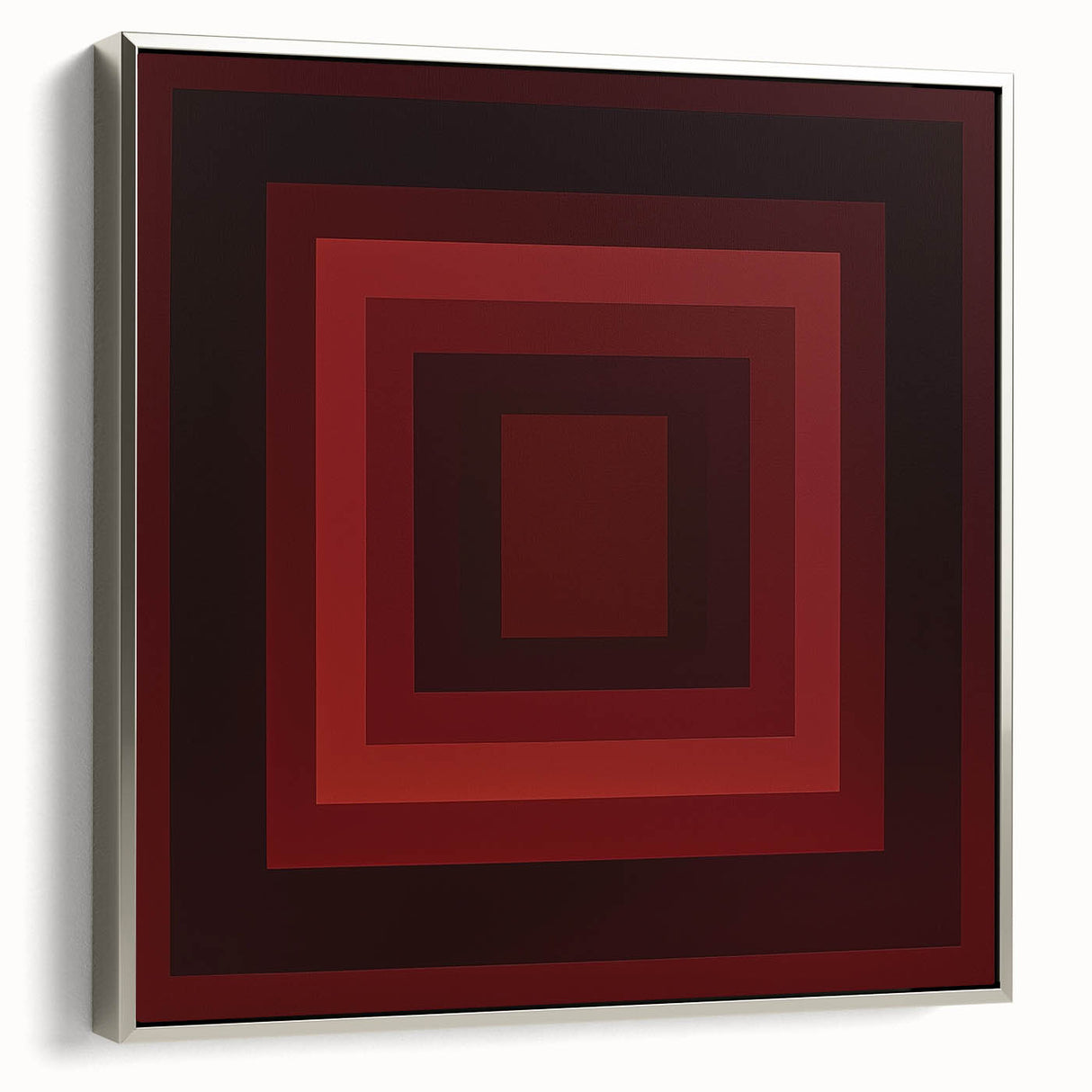 Abstract geometric framed canvas art in silver showcasing a modern design, perfect for contemporary home decor. The piece features sharp lines and dynamic shapes, ideal for adding a touch of elegance to any room.
