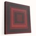Abstract geometric stretched canvas artwork showcasing vibrant colors and dynamic shapes, ideal for modern home decor. Side view highlights canvas depth and texture.