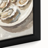 Close-up of a black framed canvas featuring a colorful, textured depiction of various food dishes.