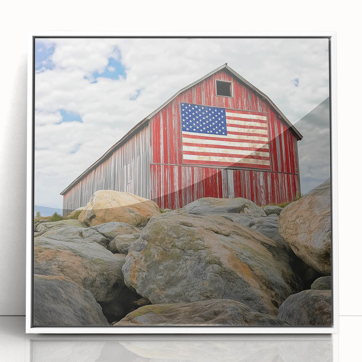 Framed acrylic artwork showcasing a serene landscape with a rustic barn, featuring a white frame that enhances the vibrant colors of the scene, ideal for home decor.