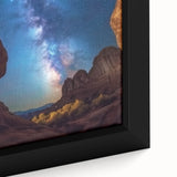 Close-up of a framed landscape canvas showcasing vibrant canyons in rich earthy tones, perfect for enhancing home decor with nature-inspired art.