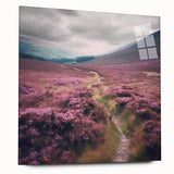 Landscape wall art showcasing a serene countryside scene with vibrant greens and soft blues, displayed in a sleek acrylic frame, enhancing any home decor.