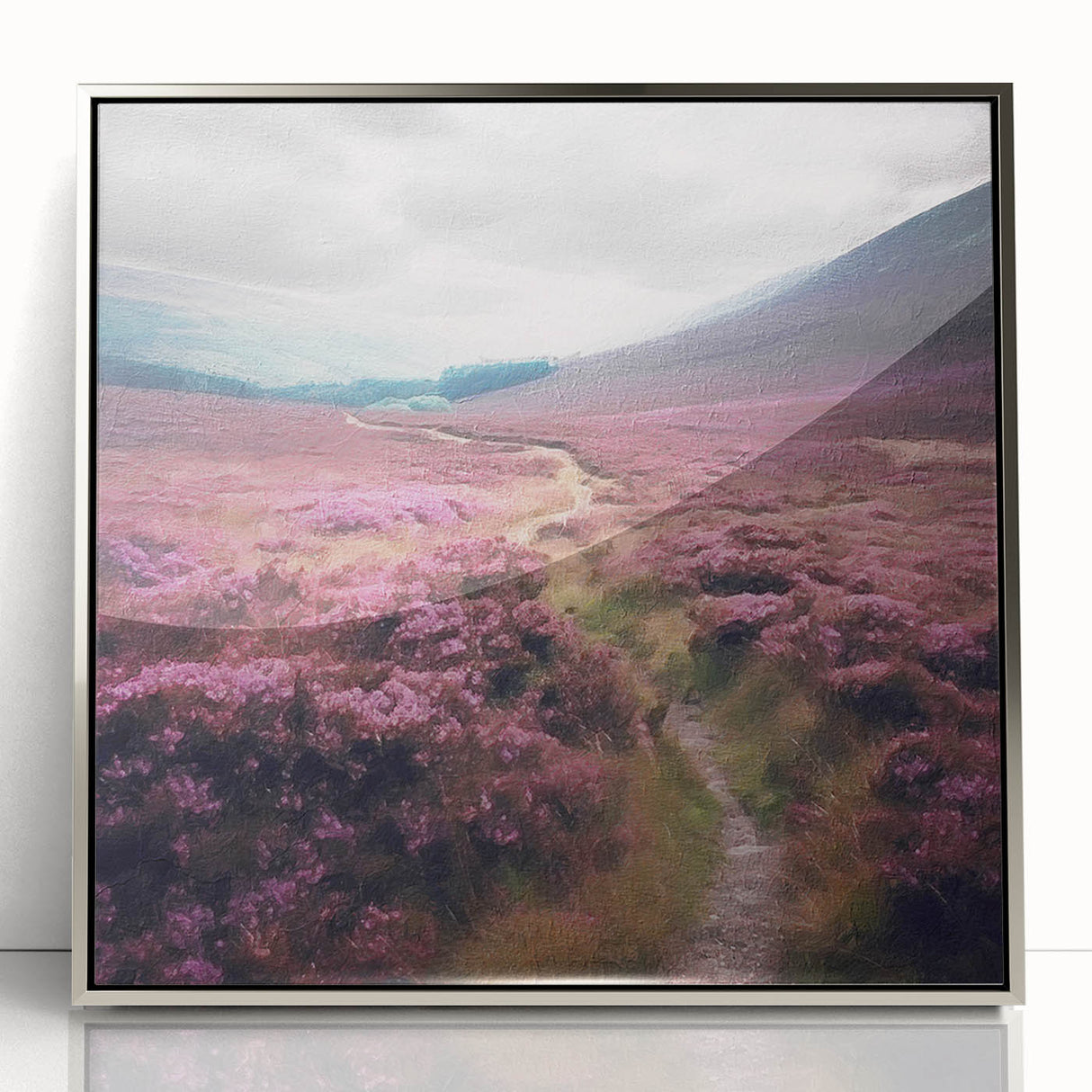 Framed acrylic wall art depicting a serene countryside landscape, showcasing vibrant greens and blues. The silver frame adds a modern touch, perfect for home decor.