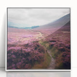 Framed acrylic wall art showcasing a vibrant landscape scene of rolling hills and a serene countryside, presented in a sleek white frame, ideal for home decor.