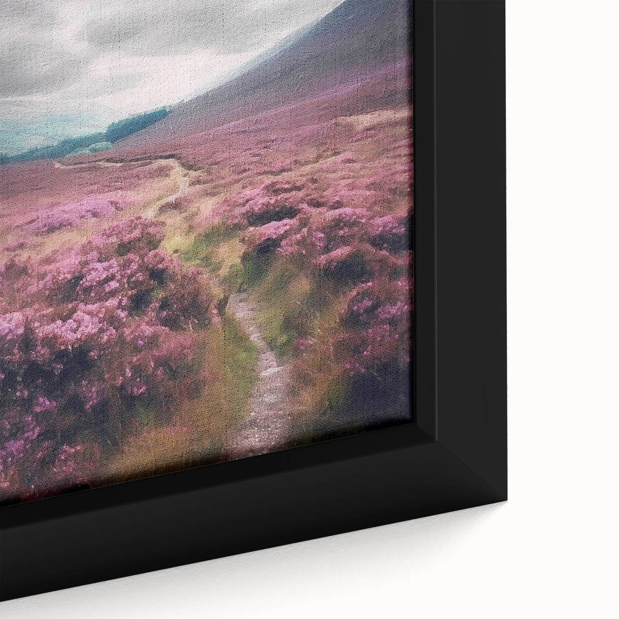 Close-up of a framed canvas artwork depicting a serene countryside landscape with lush greenery and a vibrant sky, ideal for home decor and relaxation.
