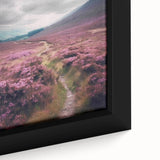 Close-up of a framed canvas artwork depicting a serene countryside landscape with lush greenery and a vibrant sky, ideal for home decor and relaxation.